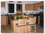 The upstairs kitchen is spacious